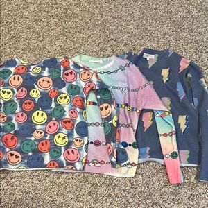 Vibrant Kids' Sweater Trio with Smiley and Lightning Designs